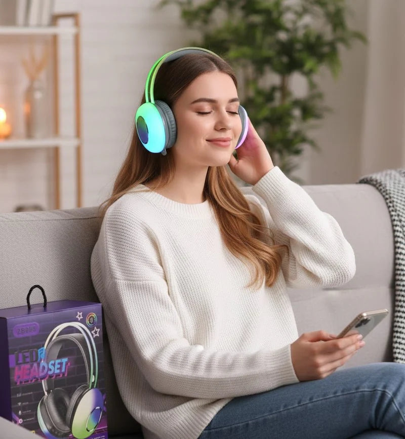 Wireless LED headset by Tanawal Mart with over-ear design and built-in microphone, illuminated with colorful LED lights.